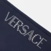 Dziecięce spodnie dresowe z rozszerzanymi nogawkami i brokatowym logo Versace