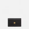 Mała skórzana torebka crossbody La Medusa