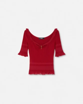 Sweter z dzianiny z agrafką