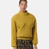 Sweter z wełnianej dzianiny z ćwiekami
